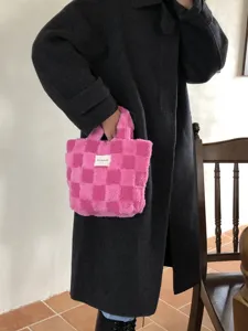 Pink checkered faux fur handbag for women, cute winter plush tote bag with top handle.