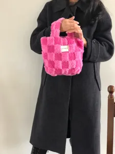 Chic pink checkered plush handbag for women, soft winter fuzzy tote bag for daily style.
