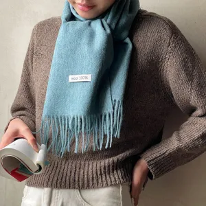 Women's solid color winter warm wool fringe scarf main product view, soft and cozy accessory.