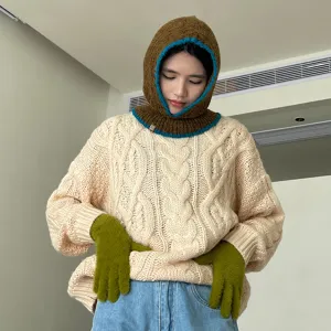 Knit balaclava detail showcasing contrast color edge, cozy texture and stylish winter accessory look.