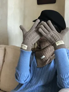 Cozy cable knit winter gloves and scarf set, warm women's knitted gloves for cold weather.