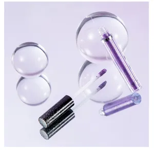 Shimmer liquid eyeshadow in vibrant purple with glitter wand for stunning eye makeup looks.