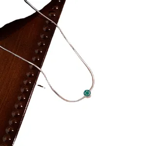 Silver snake chain necklace with turquoise enamel smiley pendant, chic fashion jewelry.