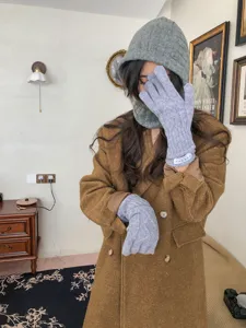 Winter warm grey knitted hooded scarf and cable knit gloves set, windproof cozy fashion apparel accessory.