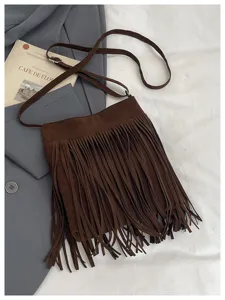 Brown suede fringe shoulder bag for women, retro crossbody bag with tassel design.