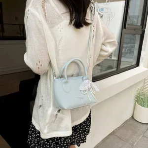 Trendy light blue women handbag shoulder crossbody bag with elegant pearl bow decoration