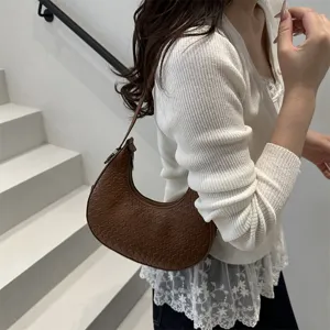 Stylish brown woven hobo shoulder bag for women, chic casual handbag for daily wear.