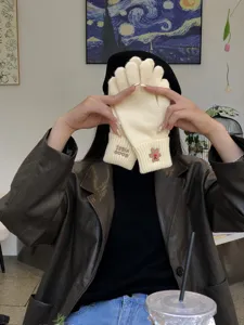 Cute winter knit gloves with bear embroidery detail, warm touchscreen wool gloves for women.