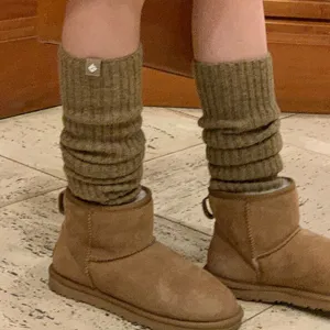 Bruine wol gebreide beenwarmers, gezellige winter laars manchetten voor dagelijks gebruik.