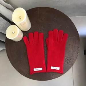 Cozy red wool gloves for winter warmth, premium soft knit thermal gloves for cold weather.