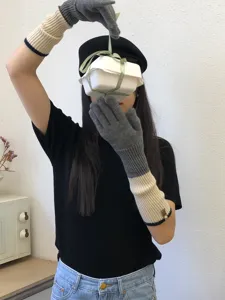 Knitted color block long gloves for women, warm winter arm warmers with cozy ribbed design.