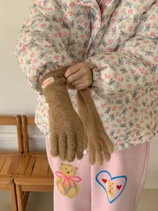 Winter warm plush touchscreen gloves for women, soft brown cozy knitted outdoor wear.