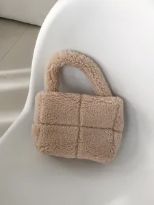Minimalist beige teddy fleece handbag for women, stylish fluffy shoulder bag with quilted grid design.