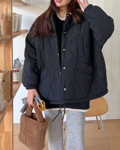 Stylish winter teddy plush handbag and quilted jacket outfit for women, cozy blogger fashion look.