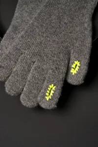 Detailed view of grey knit touchscreen gloves, showing fine wool yarn texture and neon embroidery.