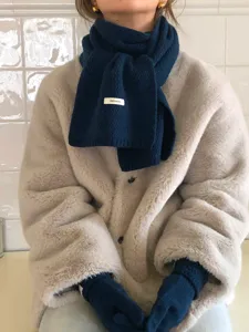 Dark blue wool scarf and gloves set, warm winter knitted cozy accessory for women.