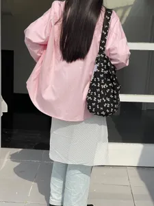 Black canvas shoulder bag with cute white bow prints, casual style for daily use and students.