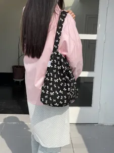 Black bow print canvas shoulder bag, casual aesthetic tote bag for daily shopping and school.