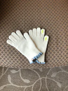 Women winter warm knitted touchscreen gloves with cute ruffle cuffs and embroidery details.