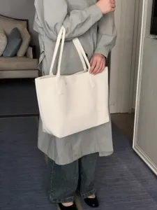 Grand sac cabas minimaliste en tricot uni, sac à épaule décontracté pour le quotidien.
