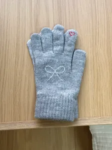 Grey winter knit gloves for women featuring rhinestone bow and cute red heart detail daily warm.