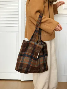Detail view of the stylish autumn winter plaid wool shoulder bag, large capacity lazy tote style.