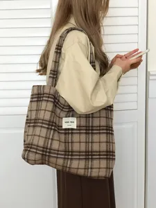 Detail shot of winter wool plaid tote bag showcasing casual style and large capacity for daily use.
