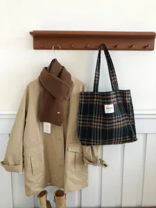 Casual plaid woolen shoulder bag with large capacity, perfect for autumn and winter daily use.