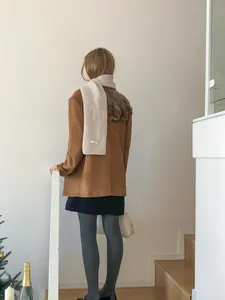 Cozy solid color wool winter scarf detail shot, elegant daily wear accessory for cold.
