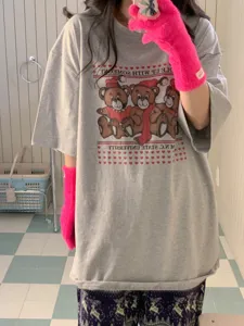Gray graphic t-shirt detail showing cute teddy bear print and short sleeves style.