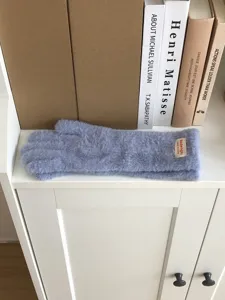 Cozy winter plush fuzzy gloves for women, soft warm solid color touchscreen gloves for cold weather.