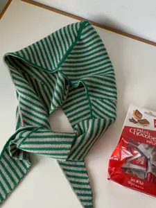 Green and beige striped knitted hooded scarf, warm winter balaclava and neck warmer accessory.
