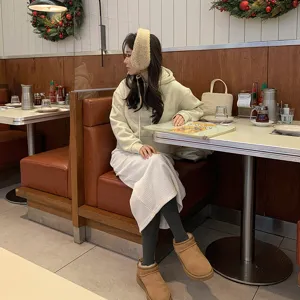 Cozy winter fluffy earmuffs for women, solid color soft plush warm ear warmers for cold weather.
