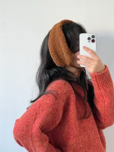 Cozy plush winter earmuffs for women, solid color soft warm ear warmers for outdoor cycling.