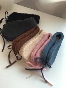 Winter plush ear warmers with cute bows, soft fleece fuzzy earmuffs for women keep ears warm.