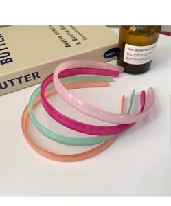 Candy color transparent headband detail showing anti-slip teeth design and vibrant translucent resin style.