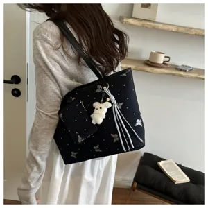 Borsa shopper nera elegante con stampa farfalla, ciondolo orsetto peluche, capiente.