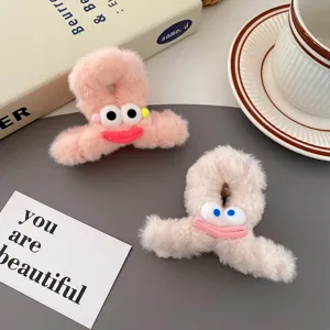 Cute plush hair claw clip with funny eyes and lips, soft winter hair accessories for women.
