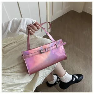 Pink holographic shoulder bag with chic buckle strap detail, stylish underarm bag for women.