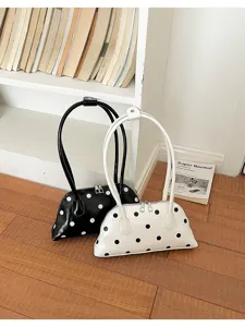 Fashion polka dot patent leather shoulder underarm bag detail, stylish shell design for daily wear.