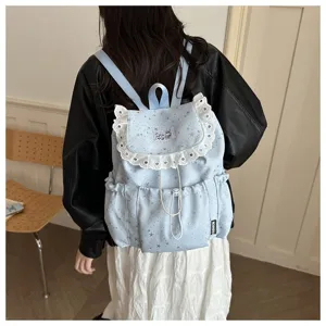 Sac à dos bleu mignon avec motif d'étoiles et volants en dentelle blanche école