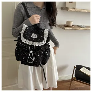 Joli sac à dos motif étoiles avec jolie bordure en dentelle et cordon pour les femmes.