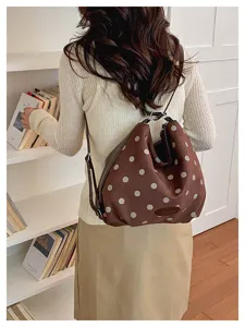 Korean style brown polka dot suede backpack, elegant large capacity shoulder tote bag detail.