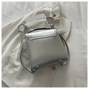 Joli sac à dos mini métallique argenté chic élégant casual école voyage pour femme