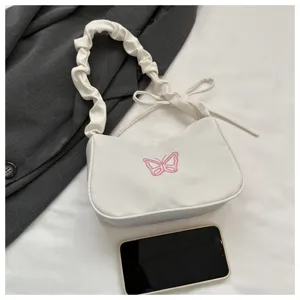 Borsa a spalla bianca minimalista da donna con grazioso design con ricamo di farfalla rosa.