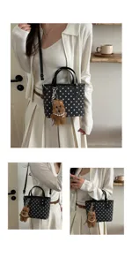Schicke gepunktete Eimer-Umhängetasche für Damen, stilvolle tägliche Pendler-Handtasche.