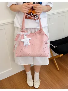Pink star print canvas tote bag for women, stylish large capacity commuter shoulder bag.