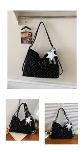 Black polka dot tote bag detail view, large capacity casual shoulder bag with star charm.