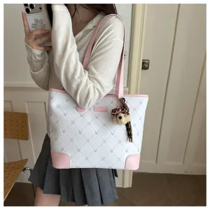 Large capacity PU leather tote bag for women, stylish pink and white commuter shoulder bag.