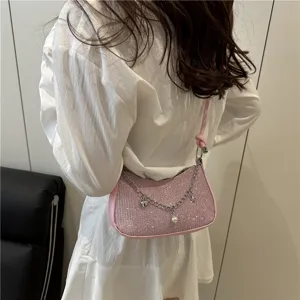 Chic pink sparkly underarm bag for women, trendy fashion shoulder and crossbody bag.